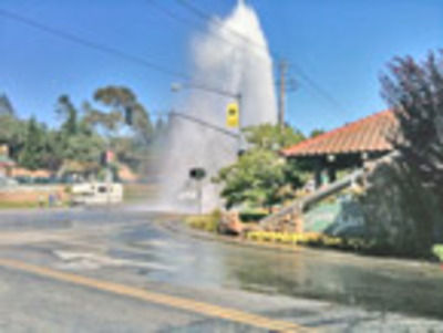 Rush-hour geyser drenches Mt. Hermon Road