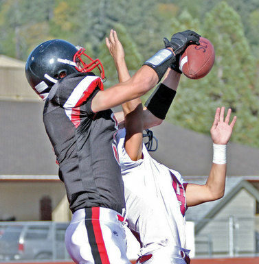 Cougars open league with loss to Sharks