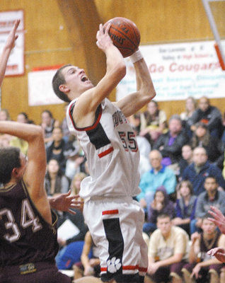 Cougars top Falcons in hoops rivalry matchup