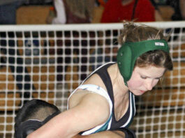 Middle school wrestler beats the boys.