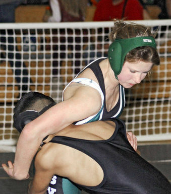 Middle school wrestler beats the boys.