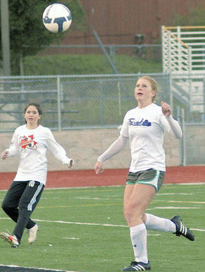 Girls soccer teams warm up for league