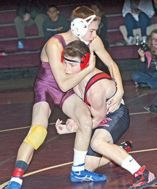 Falcons wrestlers top Cougars in league dual meet.
