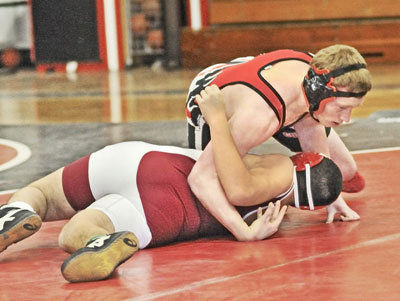 Wrestling, Cougars top Cardinals in forfeit laden match