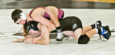 Wrestling: Falcons fall to Mariners in see-saw battle.