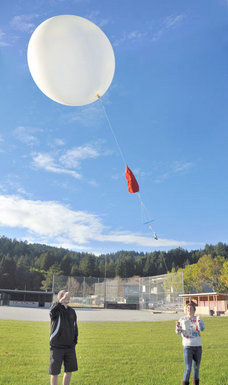 Students collect air pollution data for district