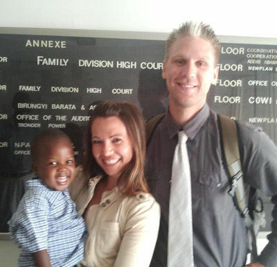 Locals return from Uganda with adopted son