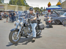 Motorcycle ride-in nets cash, food