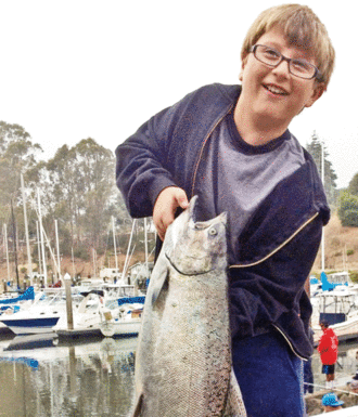 Let’s go fishin’: Huge salmon swim into the Harbor
