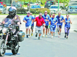 Hohmann carries Special Olympics torch through Scotts Valley