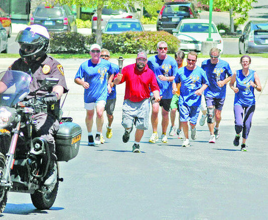 Hohmann carries Special Olympics torch through Scotts Valley