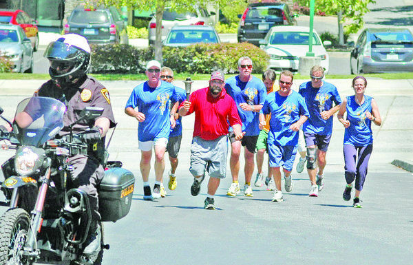 Hohmann carries Special Olympics torch through Scotts Valley