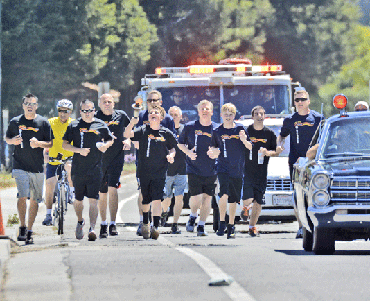 Local law enforcement runs Flame of Hope