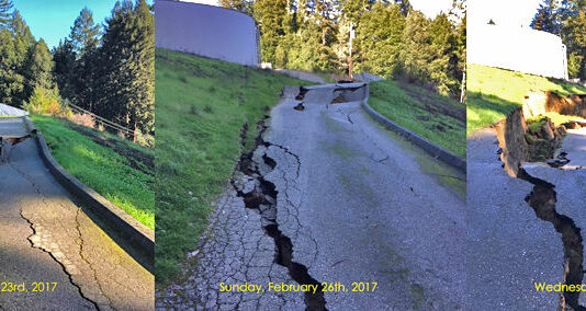 Road near huge water tank washes out