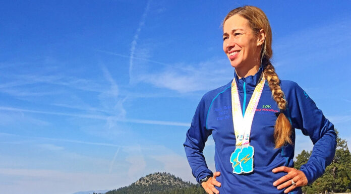 Felton marathoner medals at Tahoe event