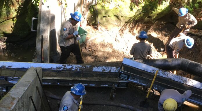 Fall Creek Fish Ladder gets cleaned following last year’s storm damage