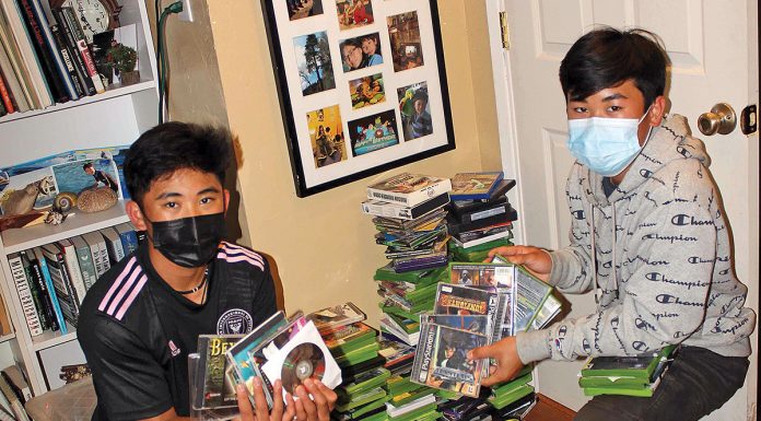 Brothers collecting used games to send to Kenya games for the globe