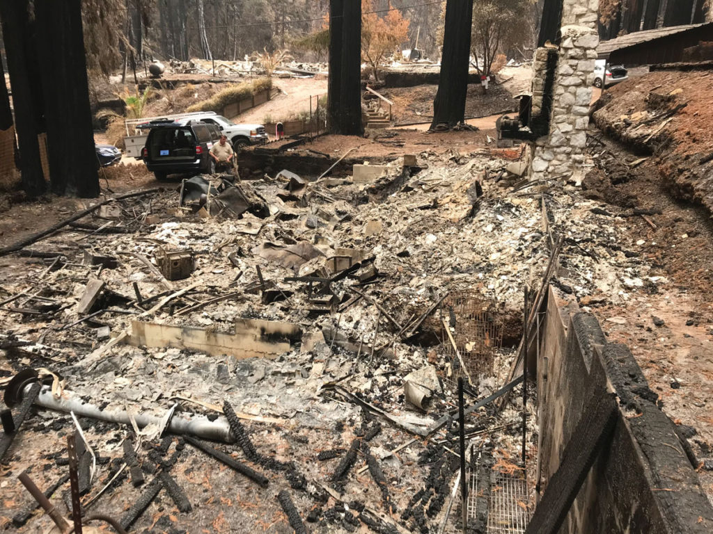 Image for display with article titled 4 Years After CZU Fire, Local Family Endures Uphill Battle to Rebuild Home