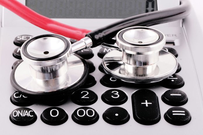 Finance-stethoscope-on-a-calculator-marek-studzinski-ZFfBwfiB2CM-unsplash Finance