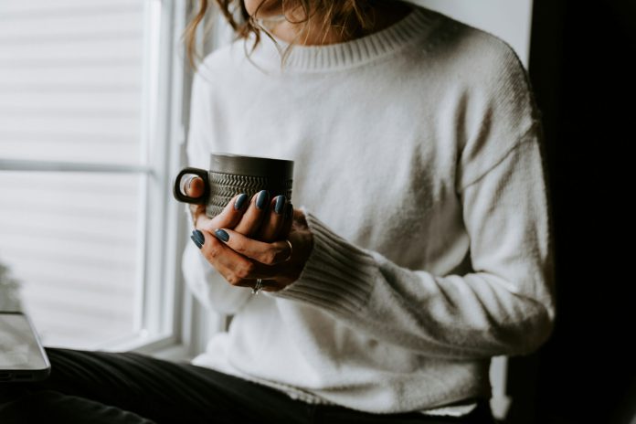 Therapy-Works-woman-holding-cup-kelly-sikkema-z0aKv4p9pH4-unsplash TherapyWorks self-care