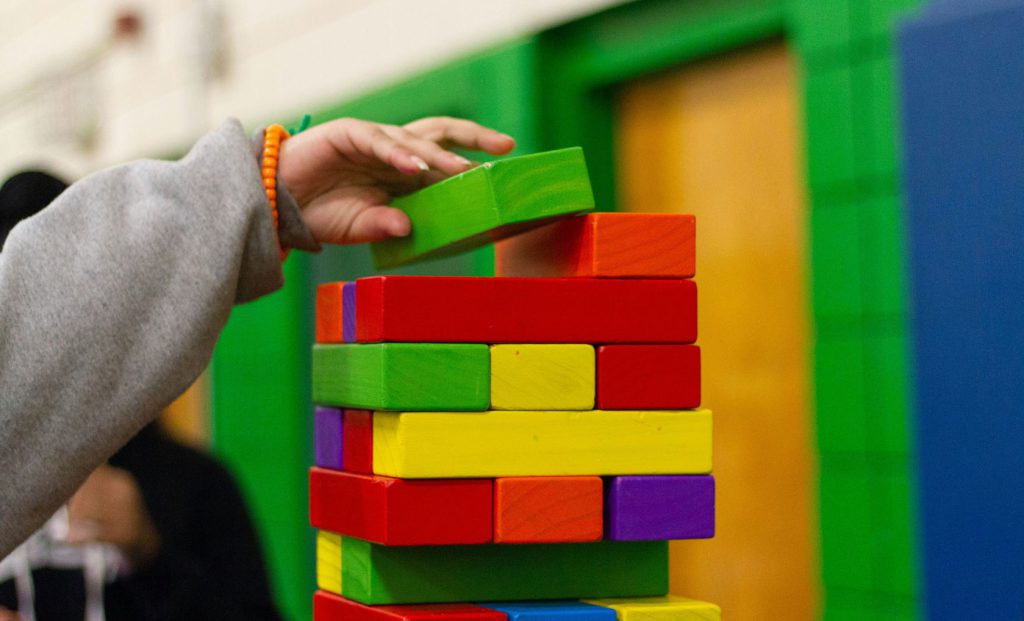 Child piling blocks