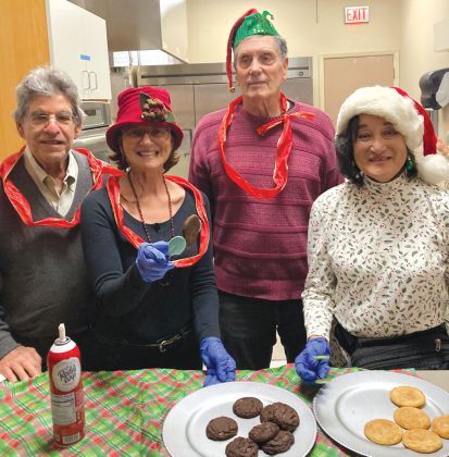 Volunteers with cookies