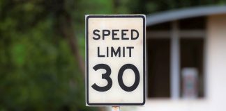 Caltrans sets lower speed limits along Highway 9 speed limit sign post on a roadside close up