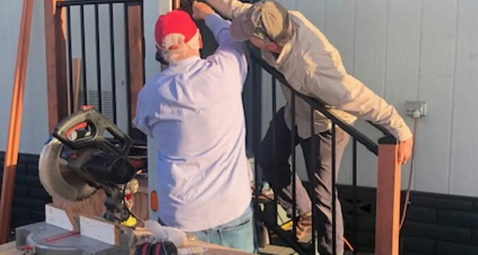 DL volunteers install railing web Damians Ladder volunteers