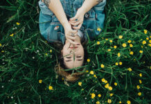 TherapyWorks | Spring Cleaning for Your Mental Health Woman in grass