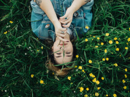 TherapyWorks | Spring Cleaning for Your Mental Health Woman in grass