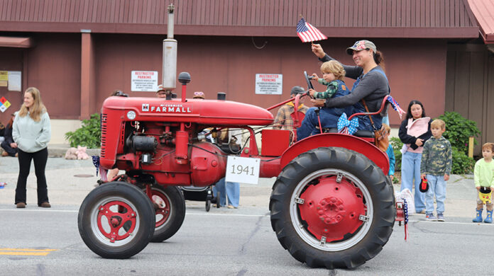 1 FRP 2026 mom and child on tractor Felton Remembers Parade