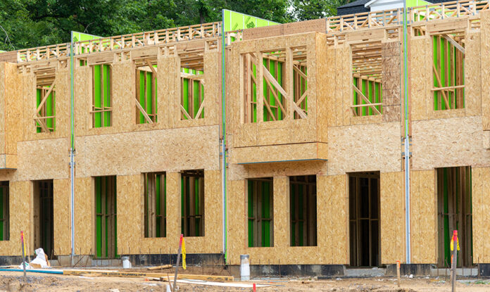Finance affordable housing construction AdobeStock_1250494785 Affordable housing developments under construction