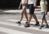 Scotts Valley police launch school safety enforcement Father holding hands with his kids while on pedestrian crossing