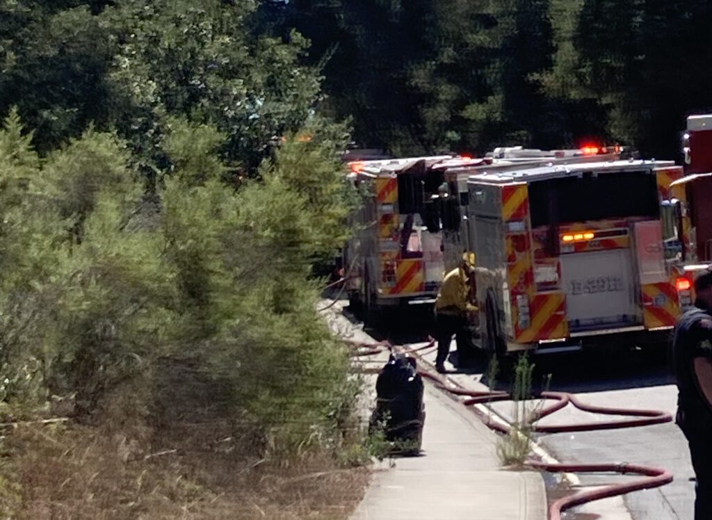 firefighter at his truck
