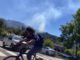 UPDATED: Scotts Valley vegetation fire under control, police investigating tip about homeless encampment smoke in the background