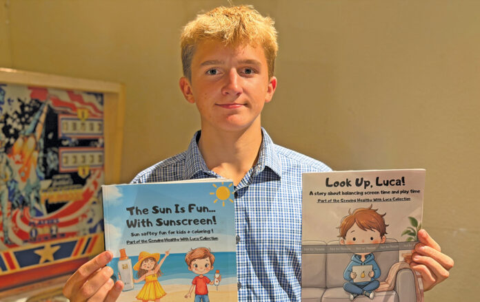 Tomas Dauksa with books Tomas Dauksa