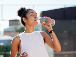 Fitness | Your Body’s Response to Dehydration Woman drinking water hydration